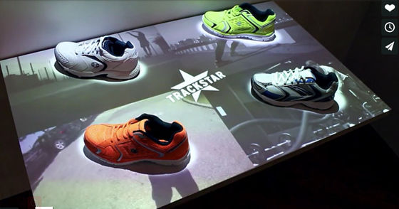 Shoe Shop Interactive Showcase Exhibit Management System Integrating Video Advertising